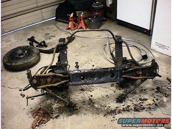 Front subframe assembly with suspension and spare tire