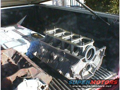 Engine block with SuperMotors logo visible