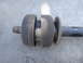 2003 Ford Taurus - This is a close-up view of a vehicle's sway bar end link, showing worn rubber bushings.
