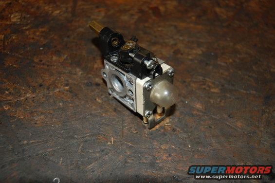carburetor assembly with brass fitting and clear primer bulb