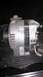 1990 Ford Bronco - A car alternator is shown, likely a replacement part, with visible labeling and electrical connections.
