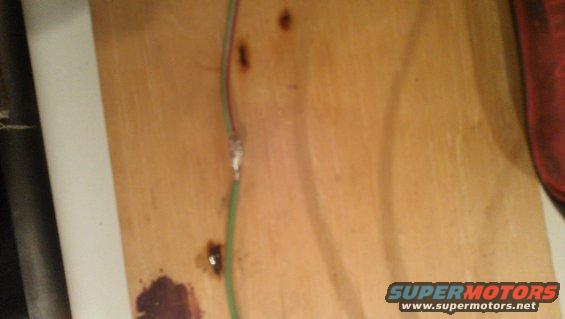 wire splice on a wooden surface