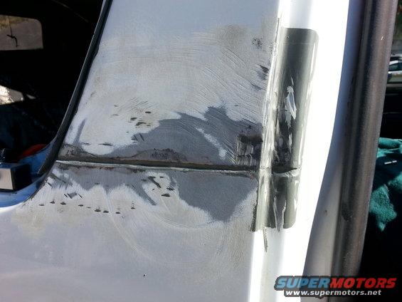 20140118_135835.jpg roughed up the b-pillar with the D/A sander and some 80 grit..seemed to work pretty well.