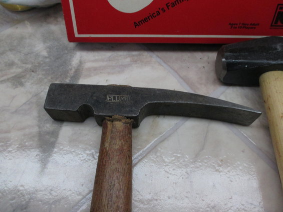 Plumb hammer with wooden handle