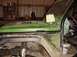 1992 Ford Bronco - Off-road vehicle in a workshop, showing interior, roll cage, and engine bay details.