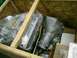 1982 Ford Bronco - Engine and transmission components are packed inside a wooden crate for shipping.
