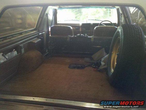 Interior view of a 1982 Ford Bronco showing cargo area and front seats
