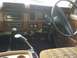 1982 Ford Bronco - Interior view of a truck's dashboard, showing gauges, radio, and shifter setup.