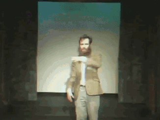 Person in front of abstract art