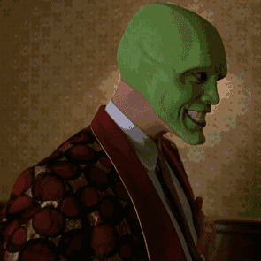 guy wearing a green mask and a suit