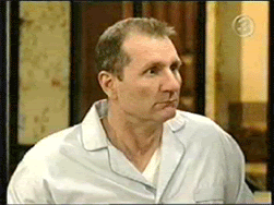 guy in light blue pajamas looking to the right