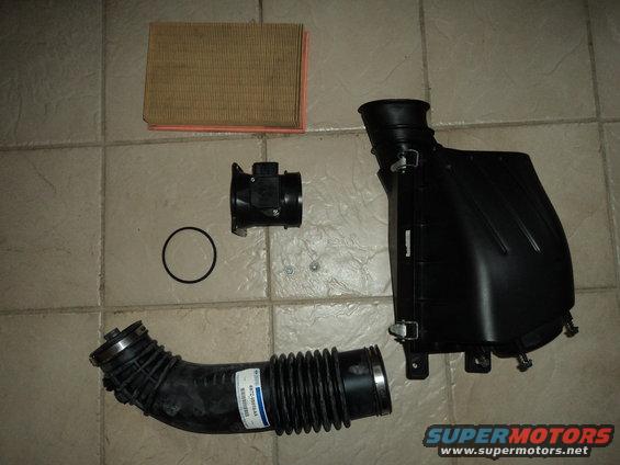 Air filter, mass air flow sensor, and intake tube
