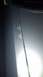 1996 Lincoln Town Car - Close-up of a car's door seam shows damage and a website watermark.