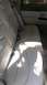 1996 Lincoln Town Car - Interior view of the rear seats and door panel of a car.