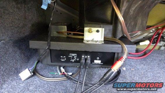 Car amplifier and RCA cables in trunk