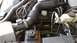 1996 Lincoln Town Car - Close-up view of a vehicle's engine bay, showing various components including the oil cap and brake fluid reservoir.