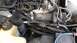 1996 Lincoln Town Car - Close-up view of a car's engine bay, showing various components and wiring.