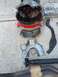 1989 BMW 3 Series - Disassembled transmission and exhaust parts are shown on a concrete surface.