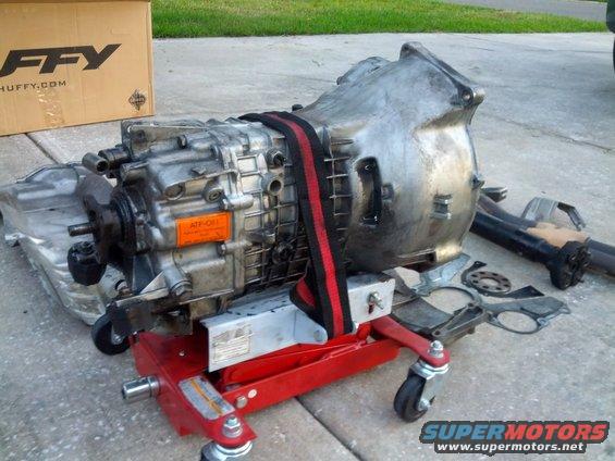 Transmission on a red jack with a Huffy box in the background