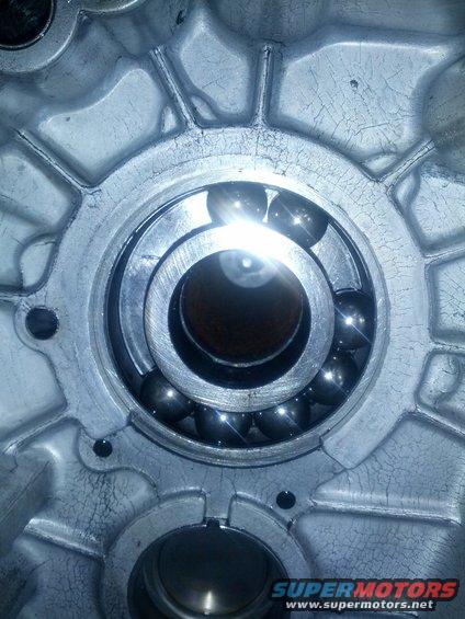 Ball bearing with multiple steel balls inside a cracked aluminum housing