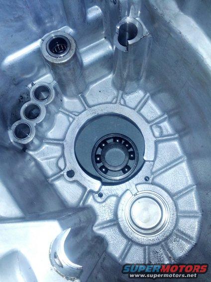Aluminum transmission housing interior with bearing and mounting holes