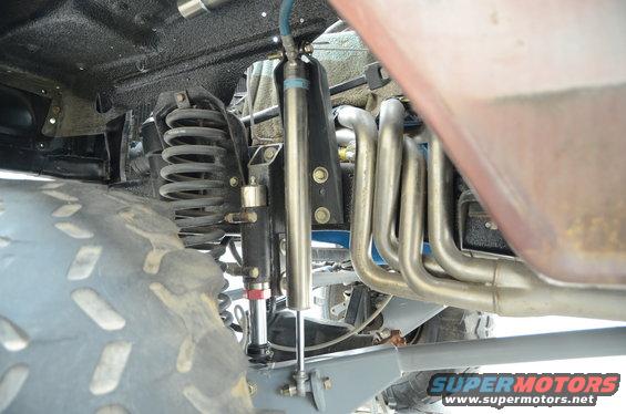 Close-up of suspension and exhaust pipes