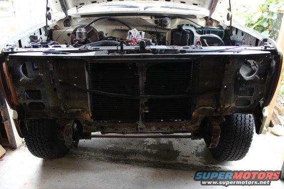 Plus air con removed including all lights and wassociated wiring.  Pretty much the front cross member held in by 4 bolts ready to go to shop for engine lift.