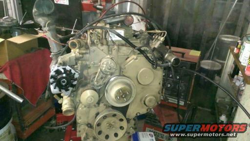 Engine assembly with alternator and pulleys