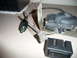 1993 Mazda MX-3 - Collection of automotive electrical components, possibly for a power antenna or similar system.
