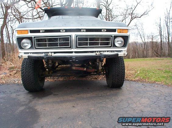 1979 Ford Bronco front grille with F O R D lettering, dual headlights, and large off-road tires