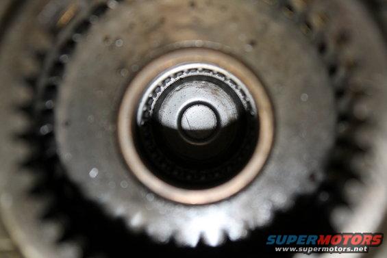 Close-up of a gear and bearing assembly, likely from a transfer case