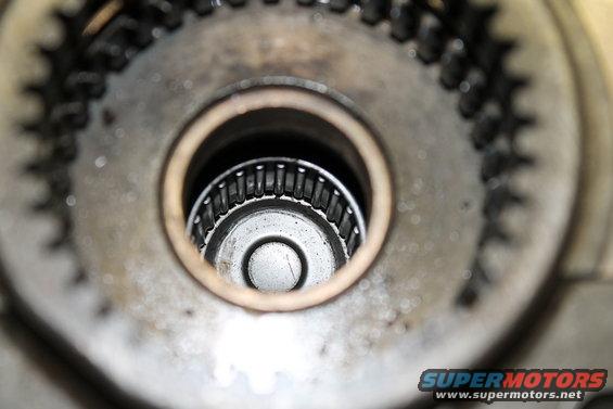 Close-up of a transfer case's internal gears and bearing