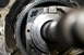 1995 Ford Bronco - Internal view of a vehicle transfer case, showing gears and a shaft.