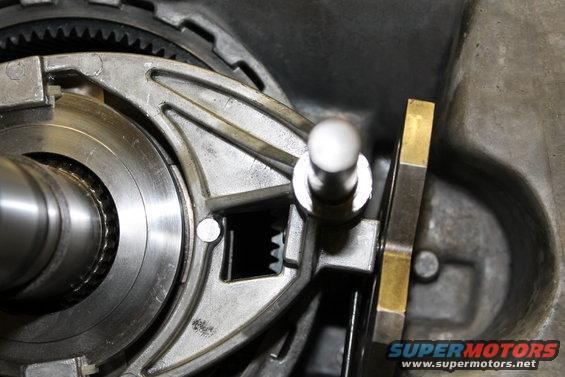 Close-up of internal transfer case gears and linkage mechanism