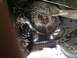 1997 Dodge 3500 - Underside view of a vehicle's transmission bell housing and drivetrain components, likely during a rebuild.