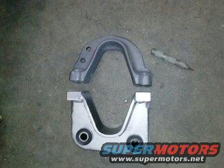 Two metal suspension components, one U-shaped, the other a bracket with a bolt hole