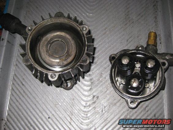 Two disassembled pump components, one with a ribbed housing and internal cylinder, the other showing three spring-loaded plungers