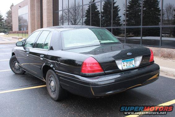 2005 Ford Crown Victoria parked in a lot, rear view. License plate ZY391