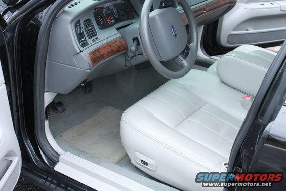 Interior of a 2005 Ford Crown Victoria showing dashboard and front seats