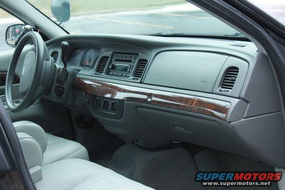 2005 Ford Crown Victoria interior showing dashboard, steering wheel, and front seats