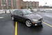 2002 Lexus IS 300 - A dark gray 2002 Lexus IS 300 is parked on a wet surface in a parking garage.