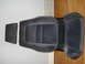 1972 Ford Pinto - This is a dark gray Recaro car seat with orange lettering visible on the seat cushion.
