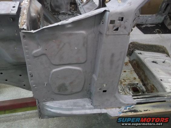 1967 Ford Mustang body shell interior showing floor pan and inner fender
