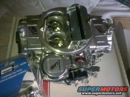 Chrome carburetor with dual barrels and "DUI SLAYER" branding
