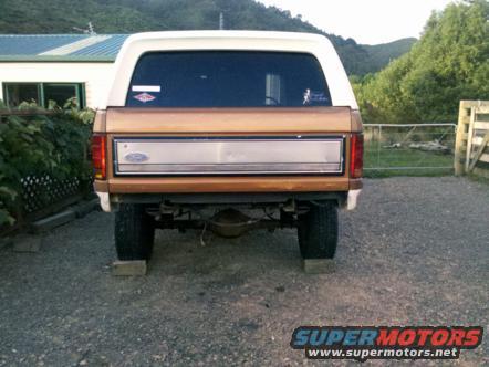 1982 Ford Bronco rear view, tan and white