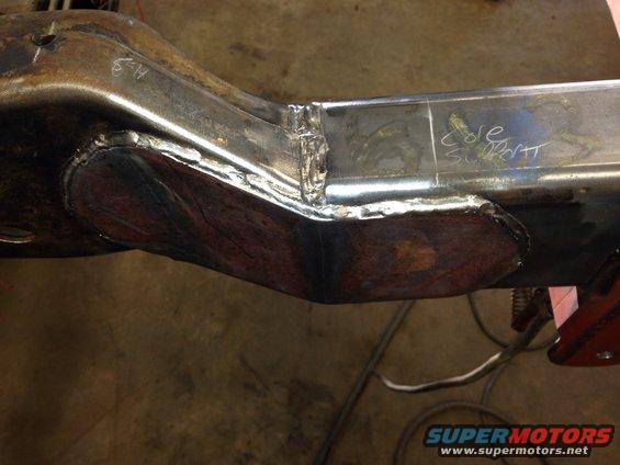 Welded metal frame section with handwritten text 'Core Support'