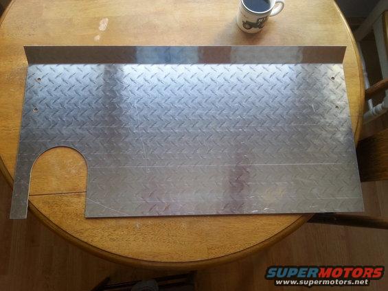 Skid plate is designed to bolt into the existing sway bar brackets. There is a 45* lip in the front that tucks behind the front bumper. It extends to the rear and upto the front crossmember. The cutout is where it wraps around the steering gear box but does not interfer with the movement of the pitman arm. End goal is that snow and mud does not push up into the serpentine belt. The last winter I had the bronco ob the road I had the belt slip 4-5 times and caused me to lose lights.  Not cool when its dark, 4-5" of fresh snow on the road, and its blowing n snowing more. 