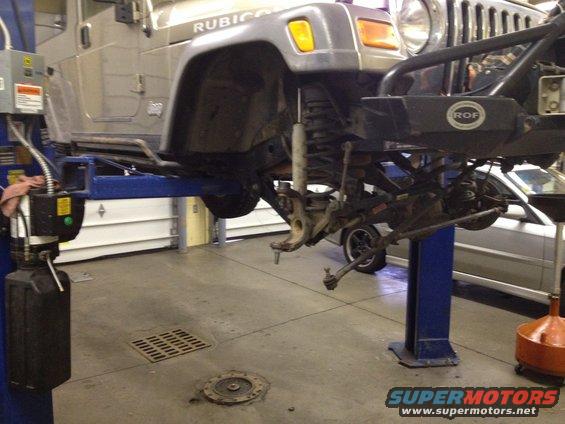 Jeep Wrangler front suspension on lift, 'Rubicon' visible