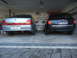 1999 Ford Fairlane - Two sedans, a silver one and a black Audi wagon, are parked side-by-side in a garage.
