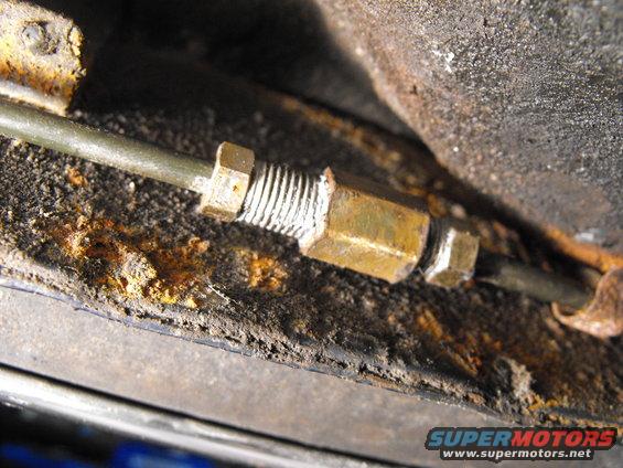 dscf3111.jpg I lather the fitting and the line under the fitting with Permatex Anti-Seize. Then it gets shot in undercating or rocker guard. Then gets lathered in greasey RustStop23, available through NAPA. Maybe, just maybe it'll make a nother 29 years